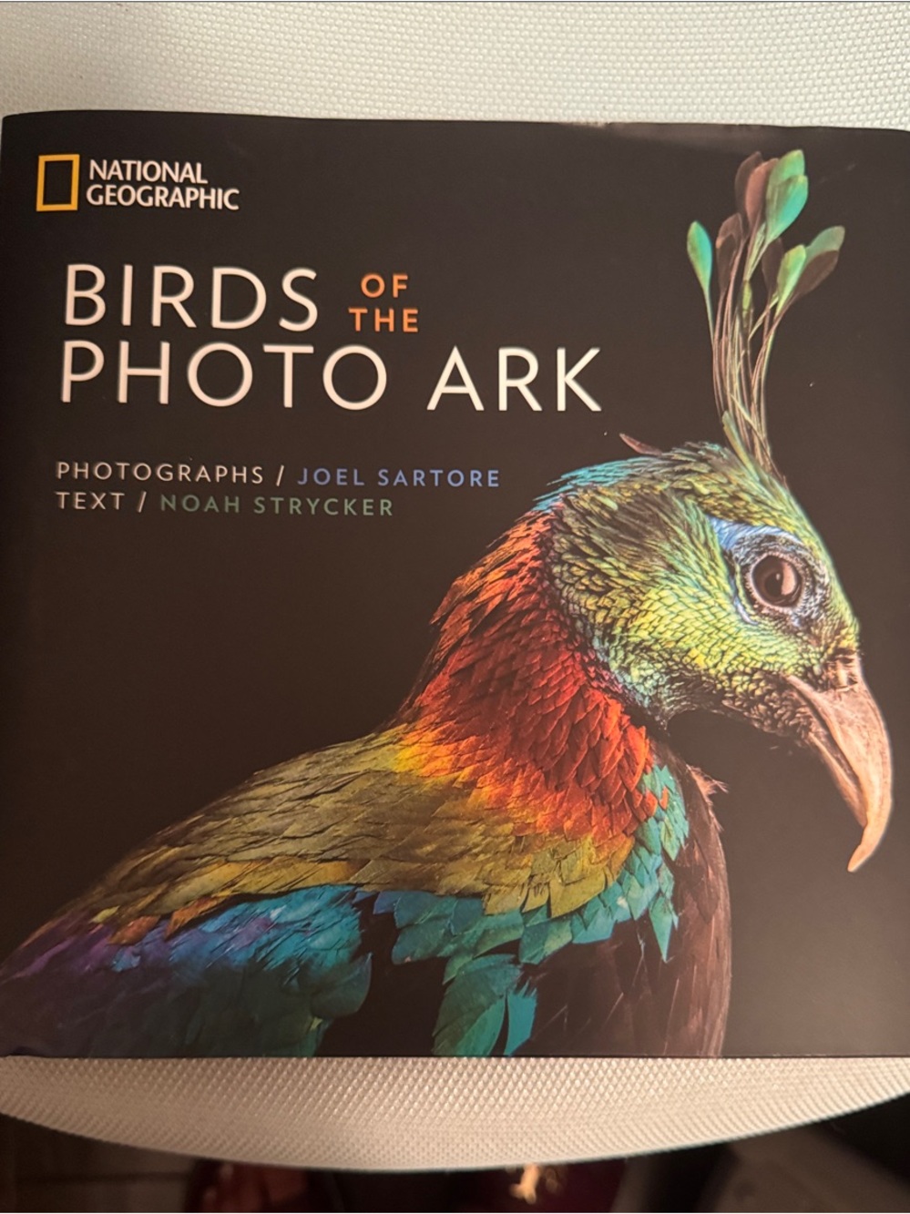 National Geographic - Vibrant Red Green Blue Bird Cover